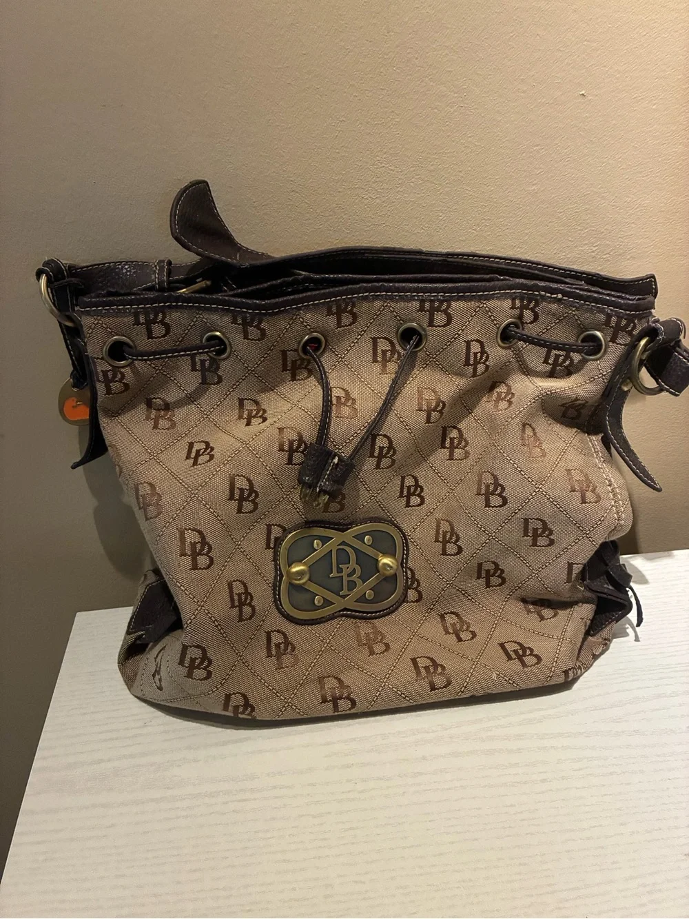 Dooney & Bourke Tan Monogram Drawstring Shoulder Bag